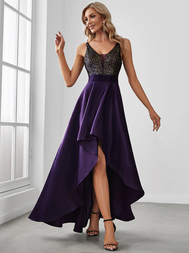 Deep purple hi low sleeveless satin formal dress with bodice detailing.