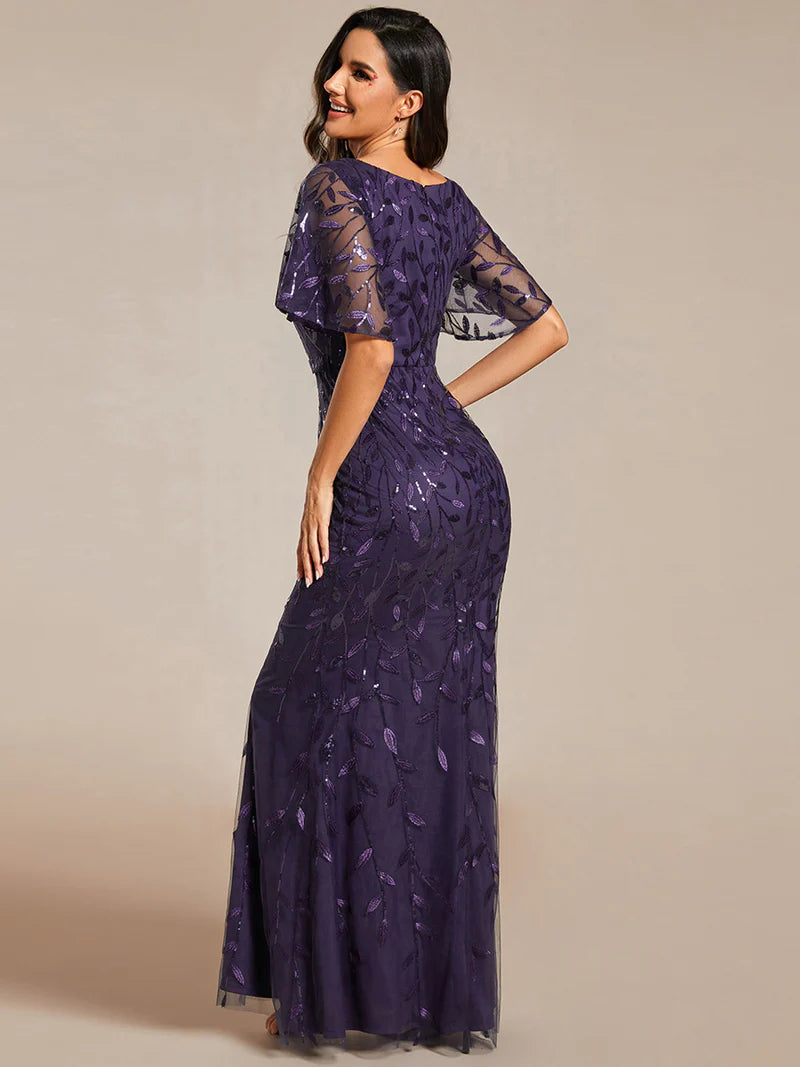 Deep purple mother of the bride dress with tulle, sequins and lace ruffle sleeves.