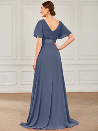 Dusty blue bridesmaid dress or formal dress in chiffon with satin band and short sleeves.