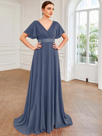 Dusty blue bridesmaid dress or formal dress in chiffon with satin band and short sleeves.