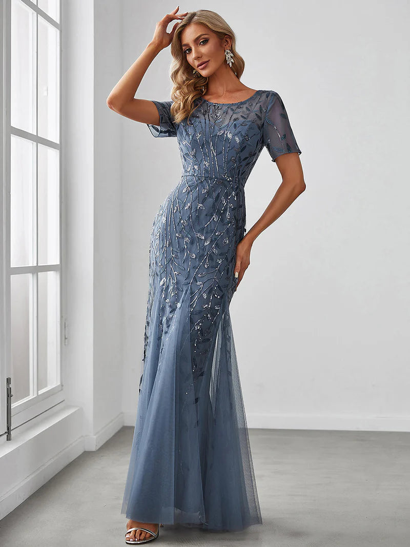 Dusty blue Mother of the bride dress, short sleeve with tulle, lace and sequin detailing.