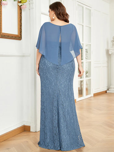 Dusty blue Mother of the Bride dress in plus size with fishtail finish, lace with chiffon cape ruffle sleeves. Graceful Elegance bridal shop services Logan, Brisbane, Gold Coast, Scenic Rim.