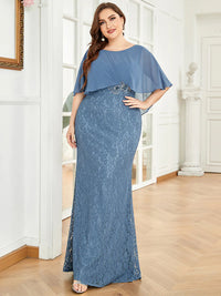 Dusty blue Mother of the Bride dress in plus size with fishtail finish, lace with chiffon cape ruffle sleeves. Graceful Elegance bridal shop services Logan, Brisbane, Gold Coast, Scenic Rim.
