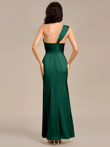 Emerald green satin formal dress or bridesmaid dress in an off shoulder  design with a split.