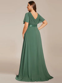 Eucalyptus green plus size bridesmaid dress or formal dress in chiffon with short sleeves and a satin band.