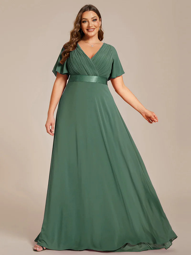 Eucalypt plus size mother of the bride dress in chiffon with short sleeves and a satin band.