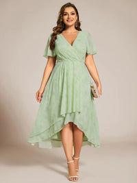 Floral green plus size mother of the bride chiffon midi dress.