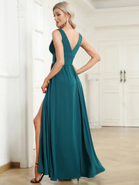 Teal sleeveless formal dress with deep v neck and front split.