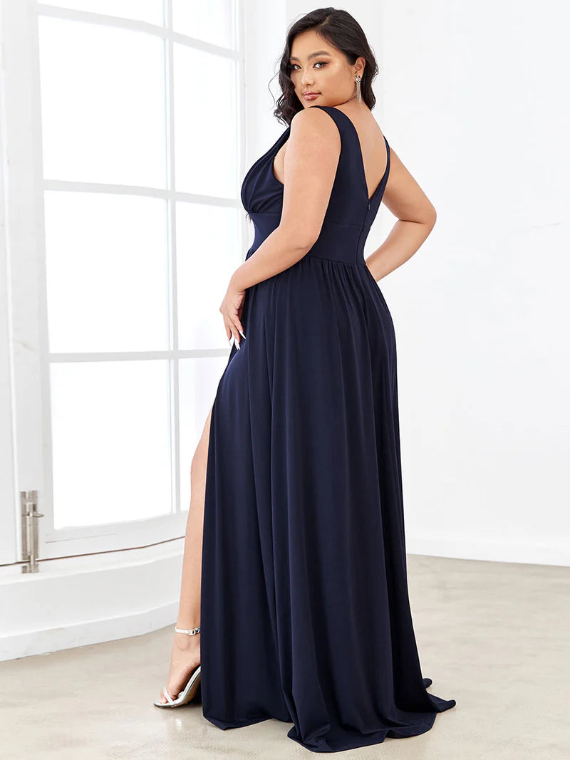 Plus sized navy blue formal dress with sleeveless and deep v-neck.