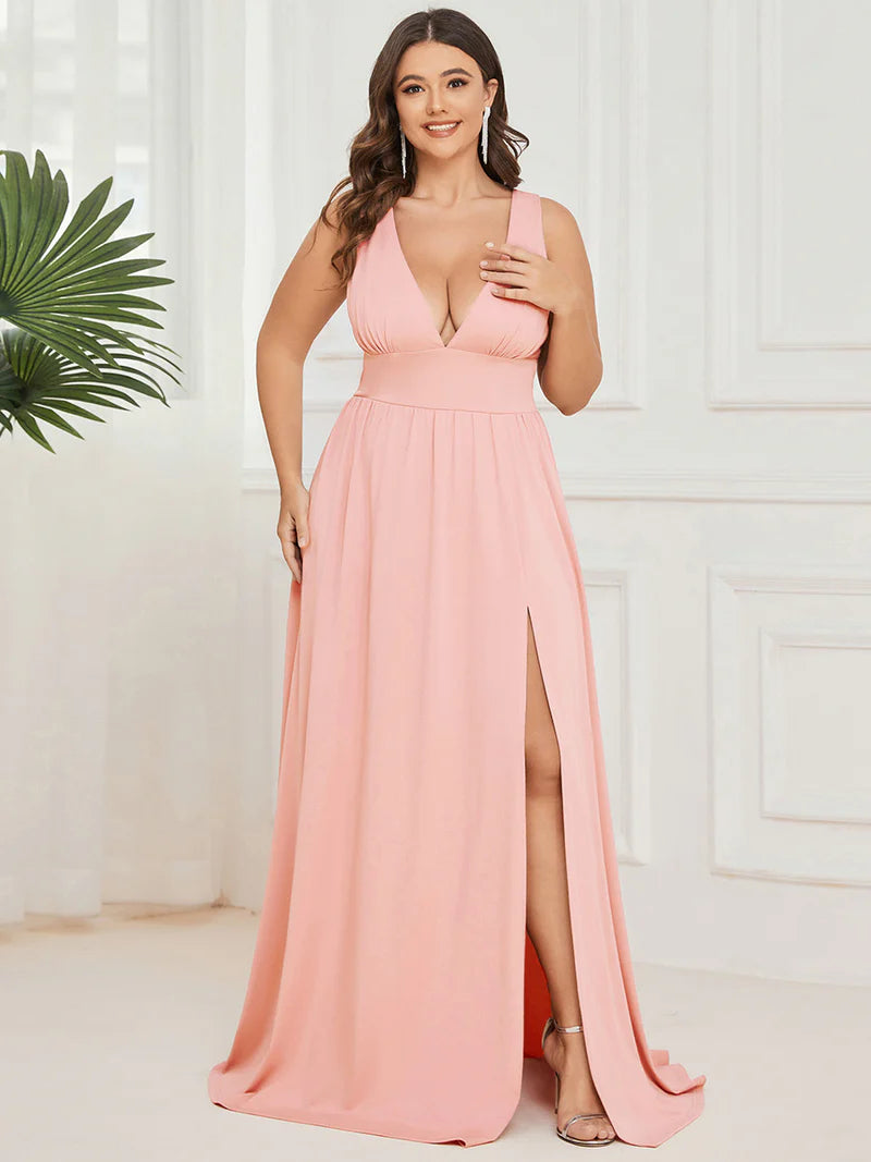 Plus sized pink formal dress with sleeveless and deep v-neck.