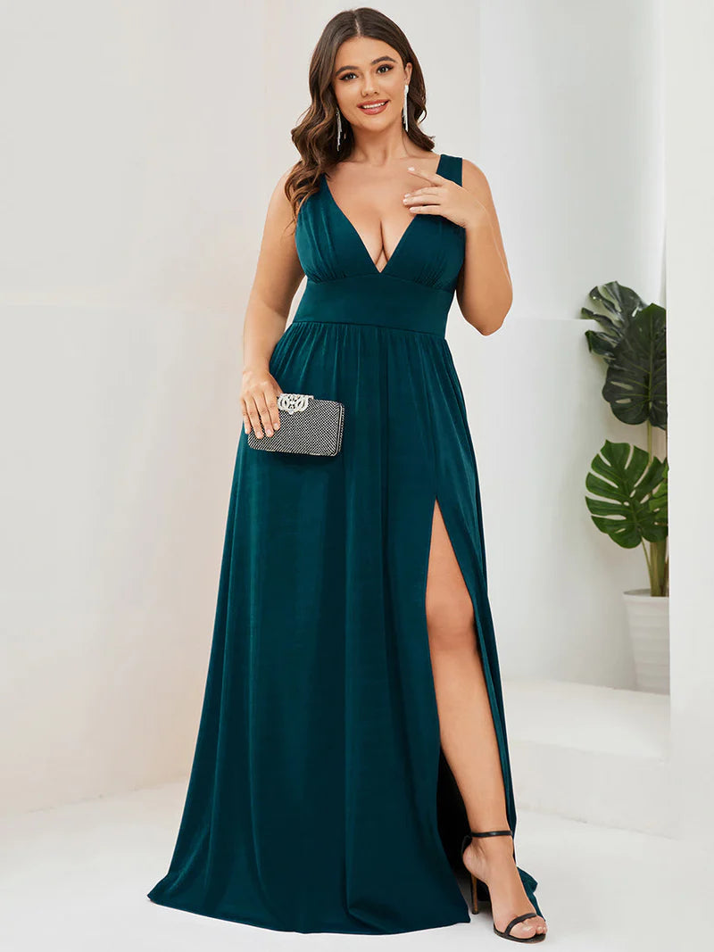 Plus sized teal formal dress with sleeveless and deep v-neck.