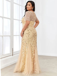 Gold champagne Plus Size Mother of the bride or formal dress, short sleeve with tulle, lace and sequin detailing.