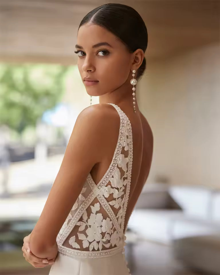 Ivory Lace and Satin wedding dress with button detail.