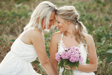 mother with beautiful daughter autumn field