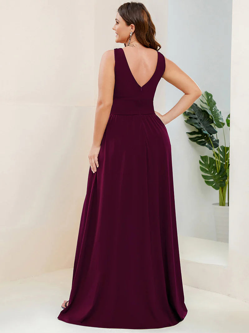 Mulberry plus size formal dress with deep v neck and split.