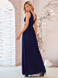 Navy blue bridesmaid dress with double v-neck and chiffon.