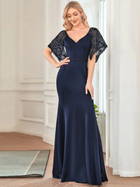 Navy blue formal or mother of the bride dress with lace sleeves, v-neck and fishtail.