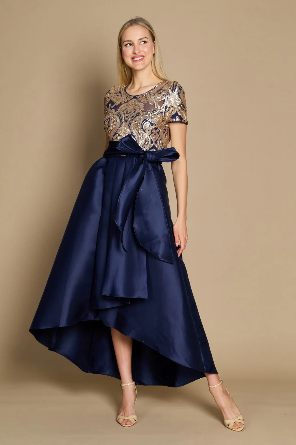 Navy blue Mother of the bride Hi Low dress with gold sequin detail on the top along with belt.