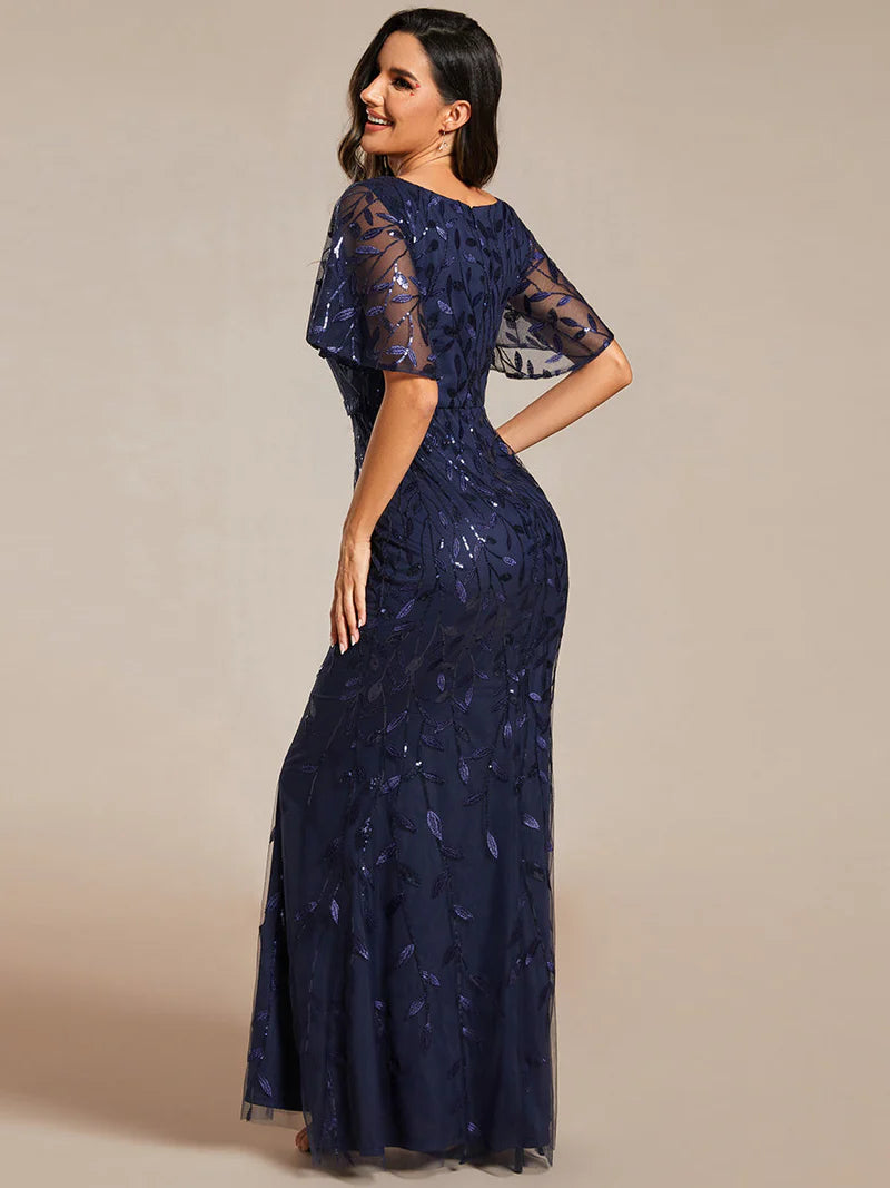 Navy Blue Mother of the bride dress with tulle, sequins and lace ruffle sleeves.