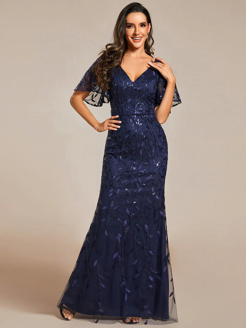 Navy Blue Mother of the bride dress with tulle, sequins and lace ruffle sleeves.