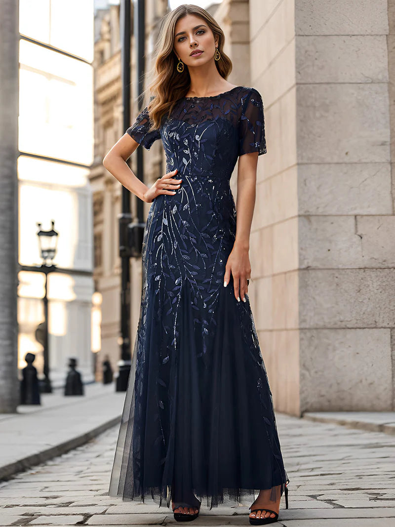 Navy blue Mother of the bride dress, short sleeve with tulle, lace and sequin detailing.