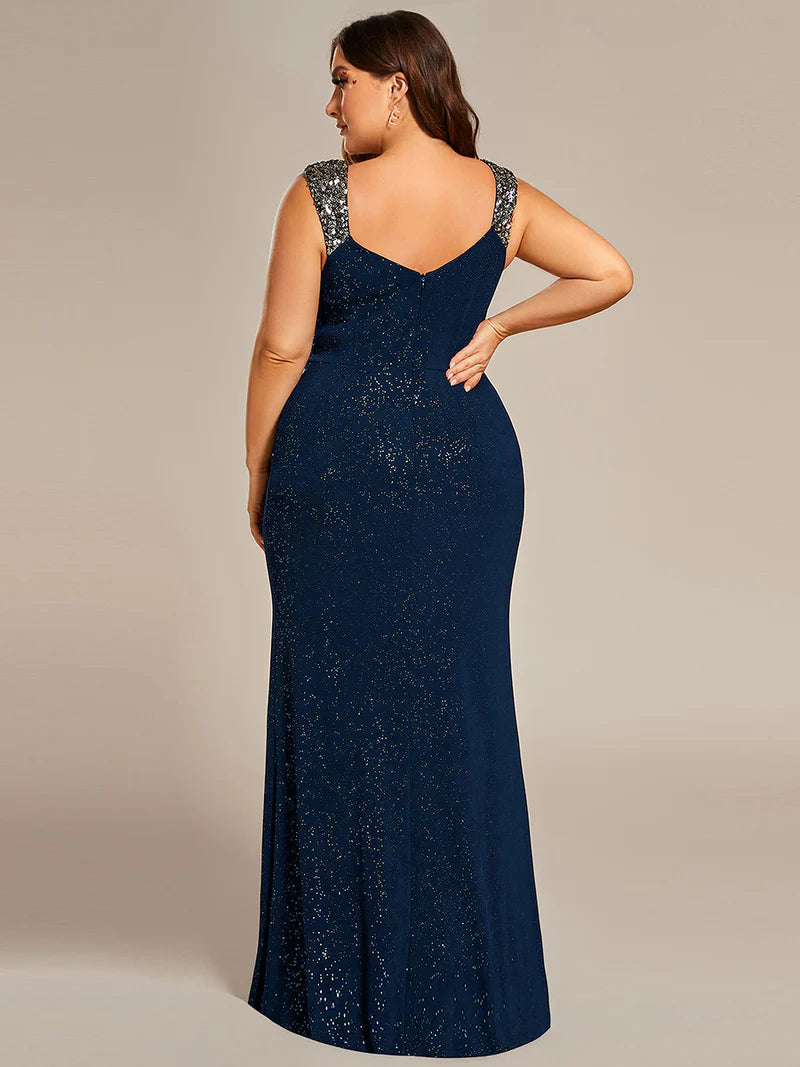 Navy blue plus sized formal dress with glitter and split front.
