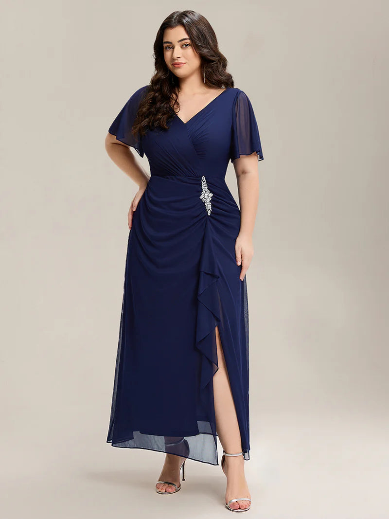 Navy Blue plus size wedding guest dress with short sleeves and  rhinestone embellishment.