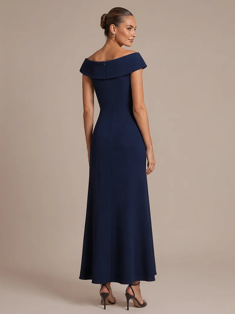 Navy formal dress with ruffle design and off shoulder style.