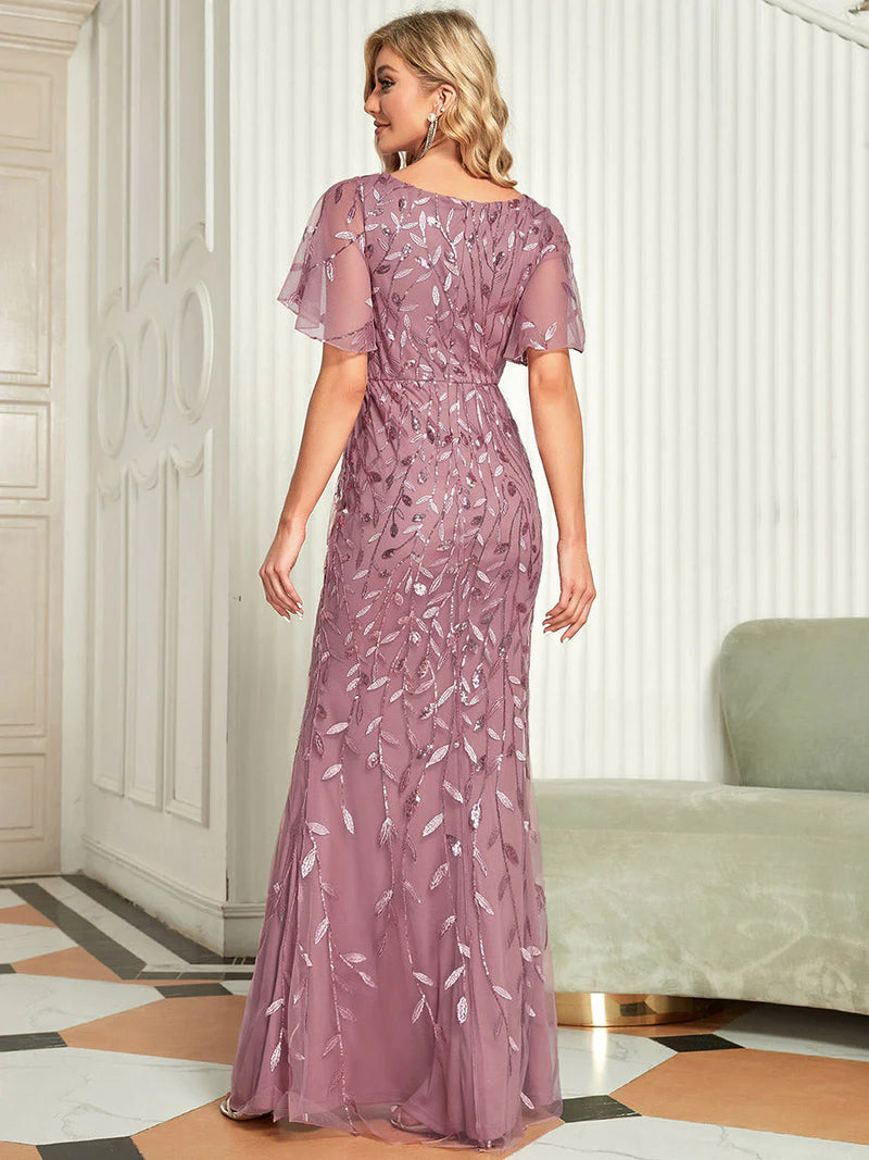 Orchid pink Mother of the bride dress with tulle, sequins and lace ruffle sleeves.