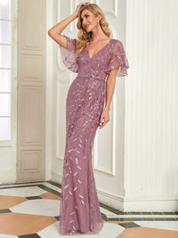 Orchid pink Mother of the bride or formal dress with tulle, sequins and lace ruffle sleeves.