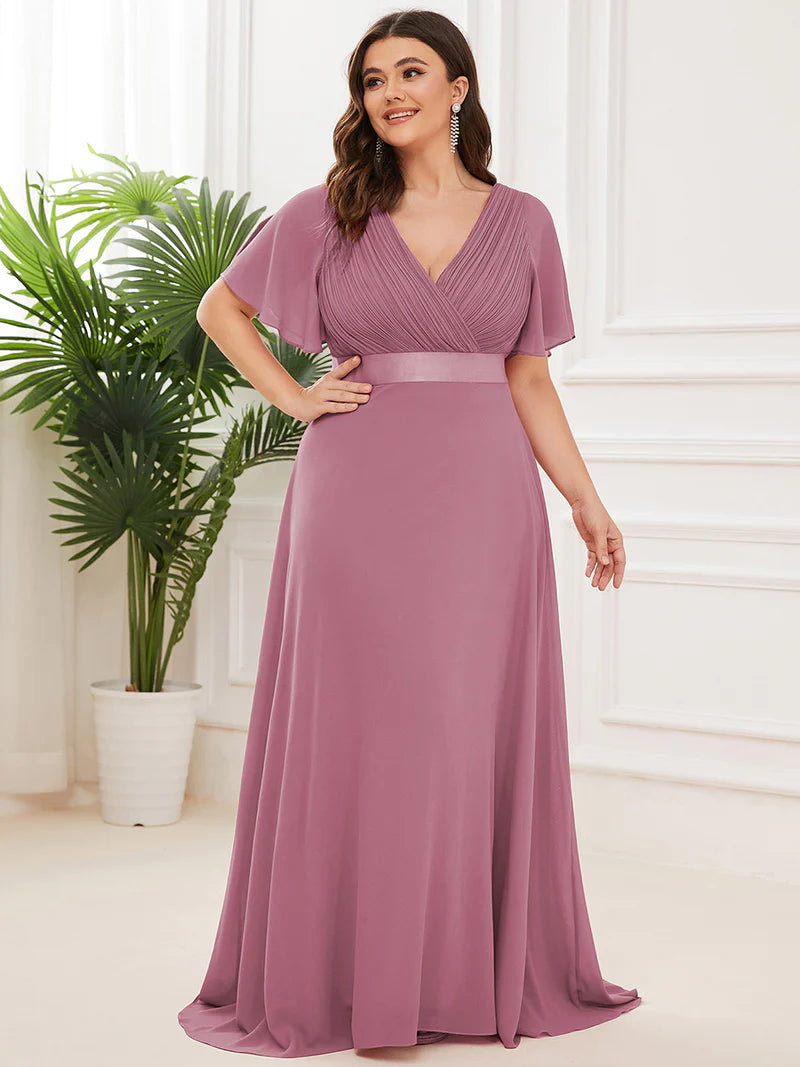 Orchid Pink plus size mother of the bride dress in chiffon with short sleeves and a satin band.