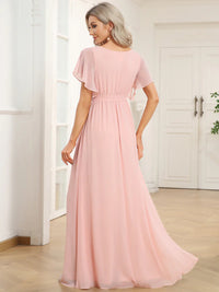 Pink bridesmaid dress with v-neck and a-line.