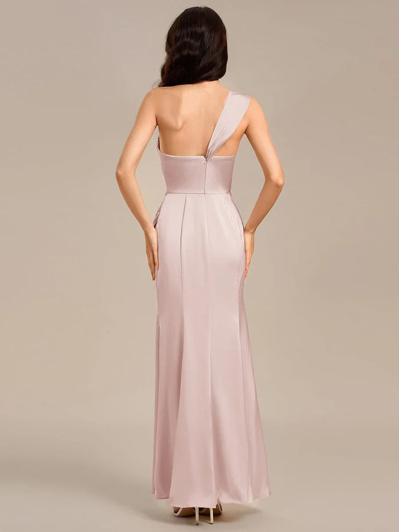 Pink satin formal dress or bridesmaid dress in an off shoulder  design with a split.