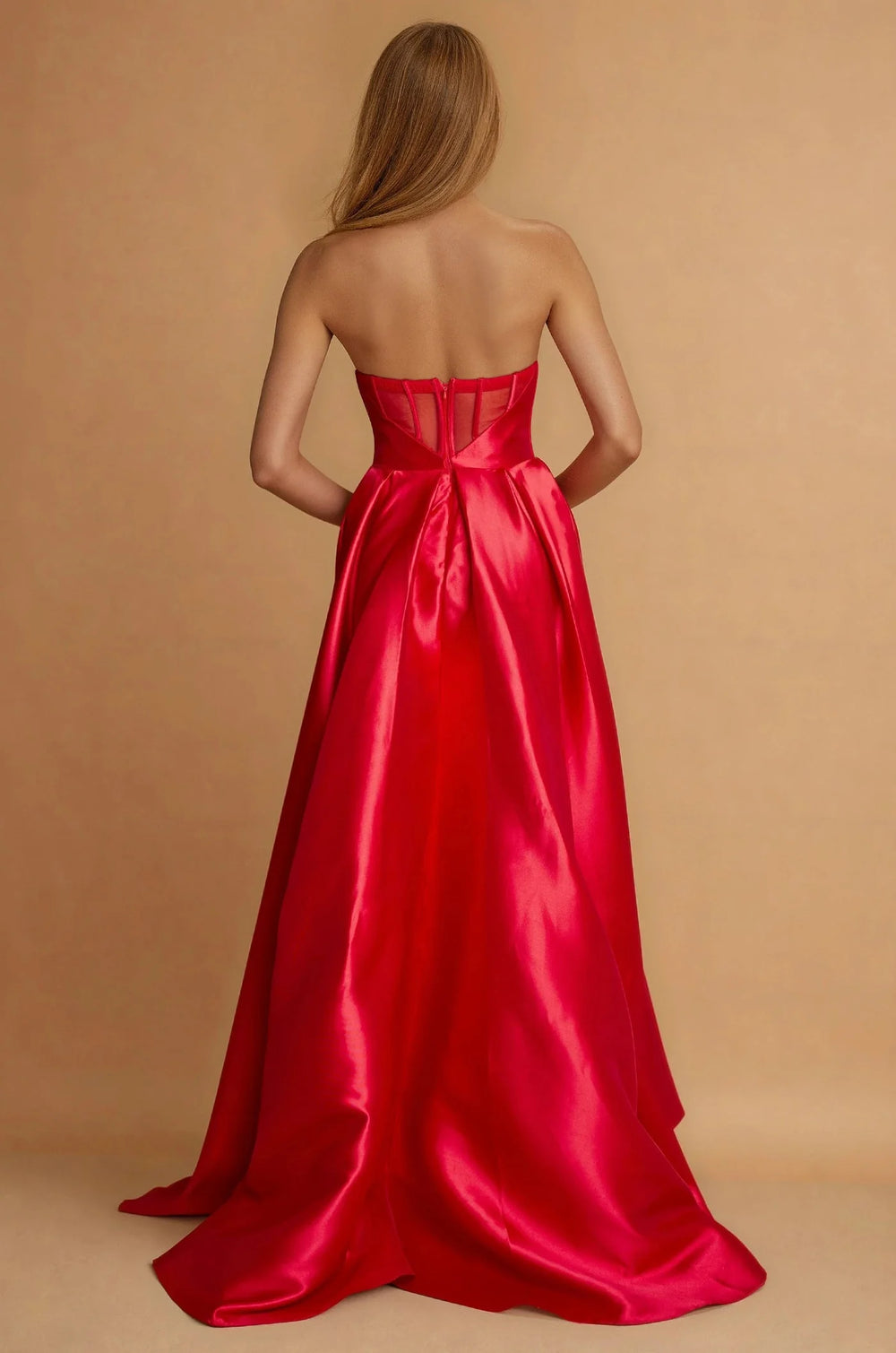 Red strapless plus size formal dress with split.