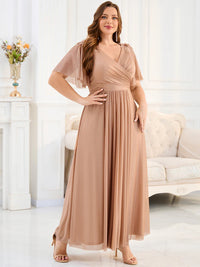Rose gold plus size mother of the bride dress or formal dress with short sleeves.