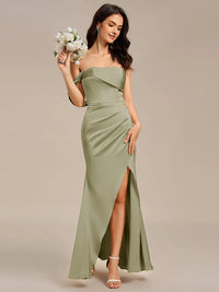 Sage green satin formal dress or bridesmaid dress in an off shoulder  design with a split.