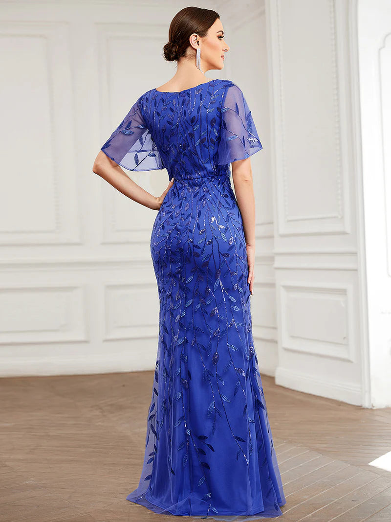 Saphire Blue Mother of the bride dress with tulle, sequins and lace ruffle sleeves.