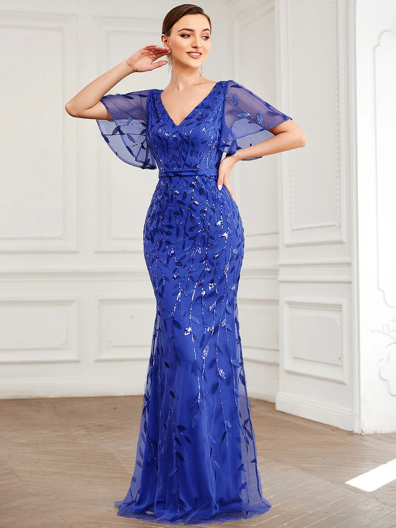 Saphire Blue Mother of the bride dress with tulle, sequins and lace ruffle sleeves.