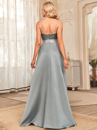 Silver-grey hi low sleeveless satin formal or mother of the bride dress with bodice detailing.