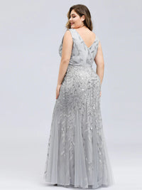 Silver plus size formal dress with sequins and tulle.