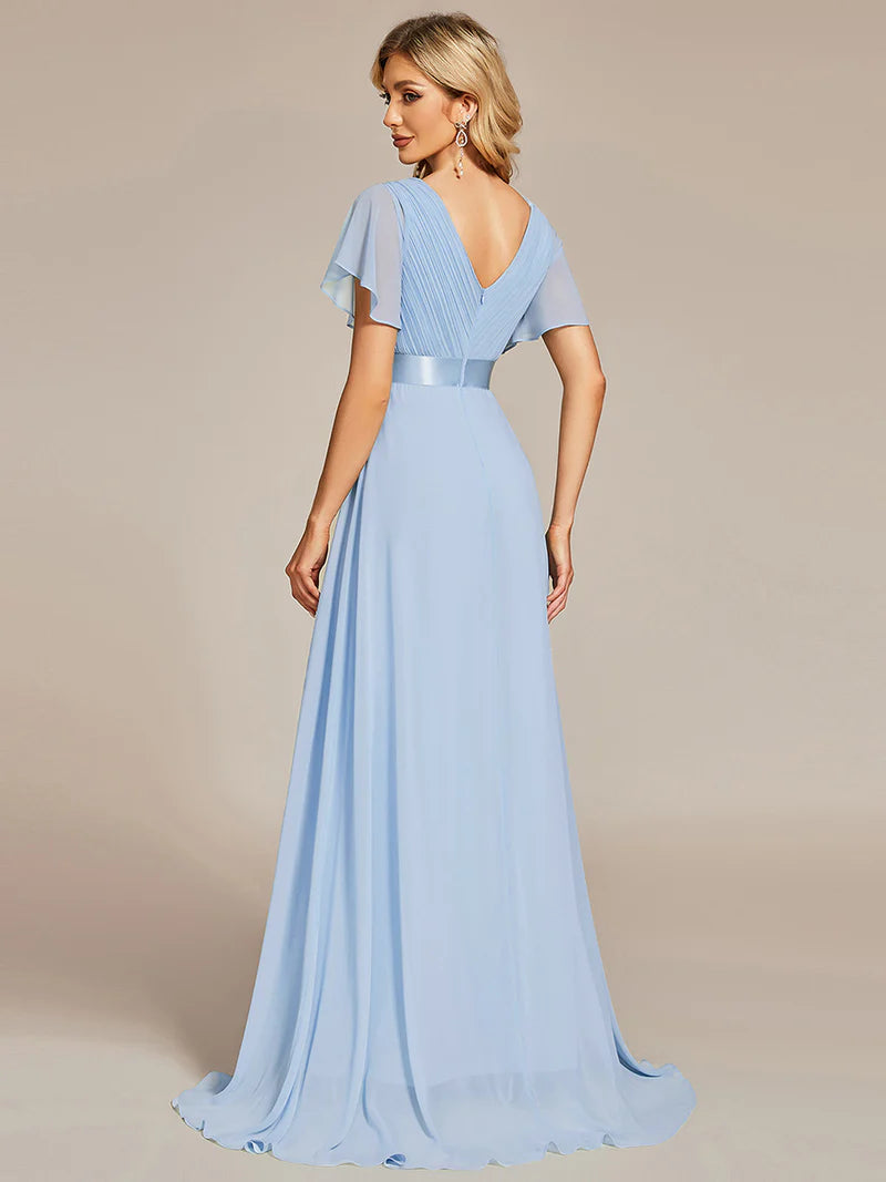 Sky blue formal dress in chiffon with satin band and short sleeves.