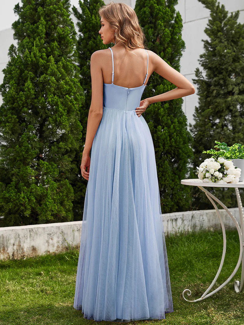 Sky blue formal tulle dress with beaded pearl top and spaghetti straps.