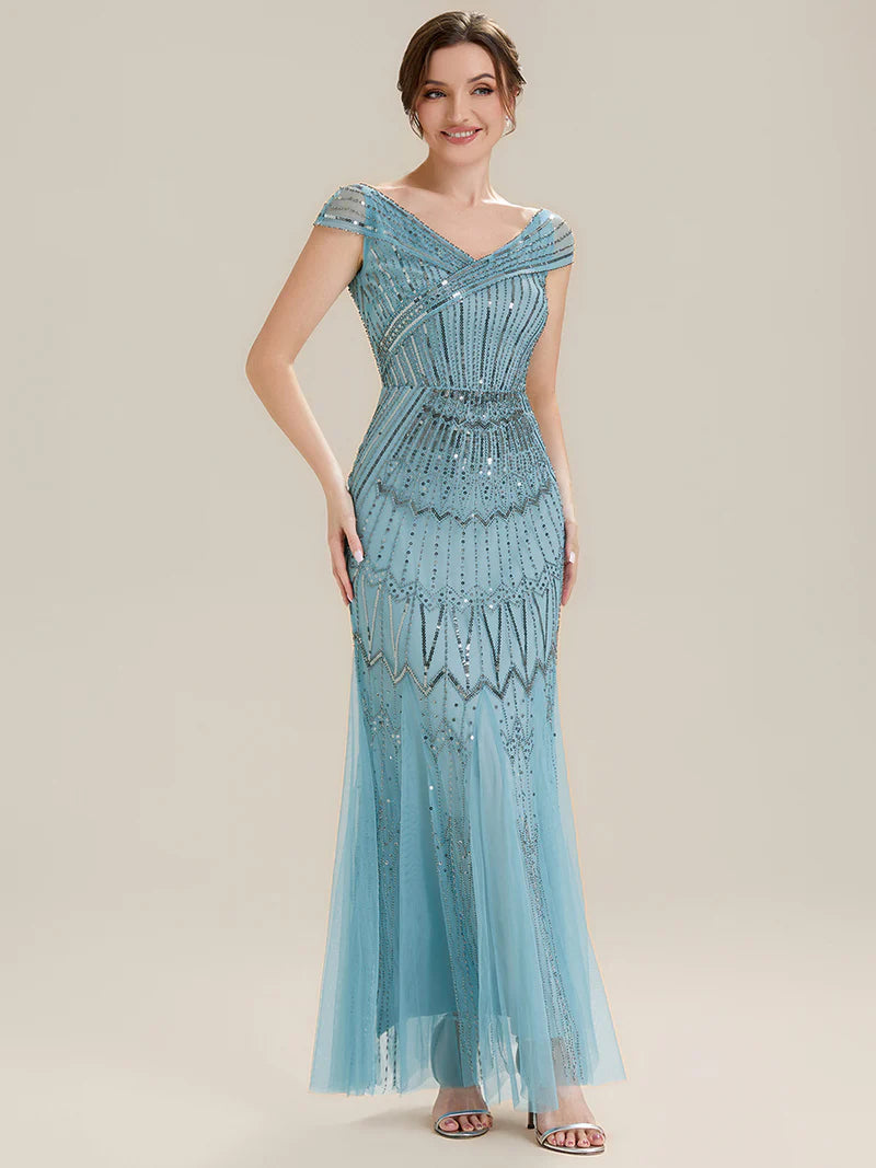 Sky Blue mother of the bride dress with sequin embellishment and short cap sleeve.