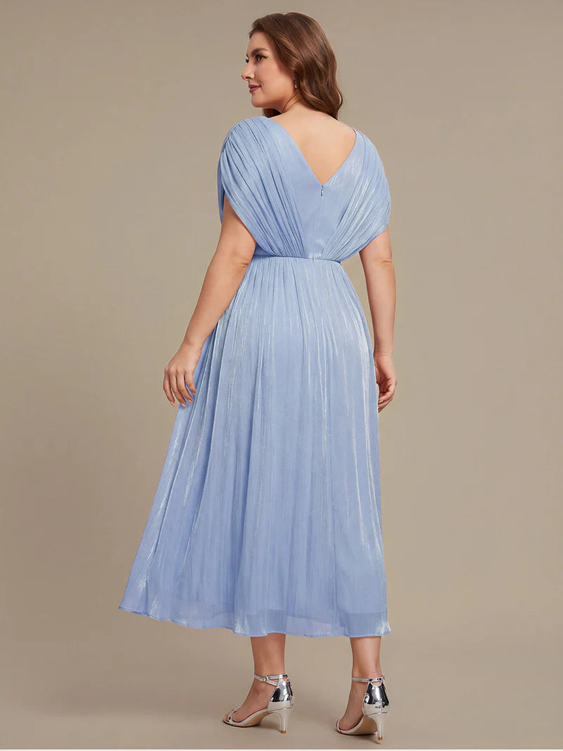 Sky blue shimmer plus size mother of the bride or guest dress with short sleeves.