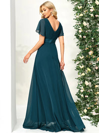 Teal bridesmaid dress or formal dress in chiffon with satin band and short sleeves.
