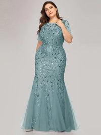 Teal Plus Size Mother of the bride or formal dress, short sleeve with tulle, lace and sequin detailing.