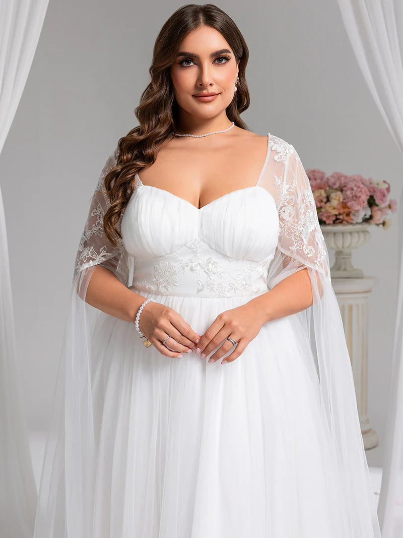 White plus size wedding dress with Long lace and chiffon sleeves.