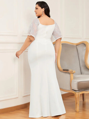 White plus size wedding dress with V-Neck and fishtail.