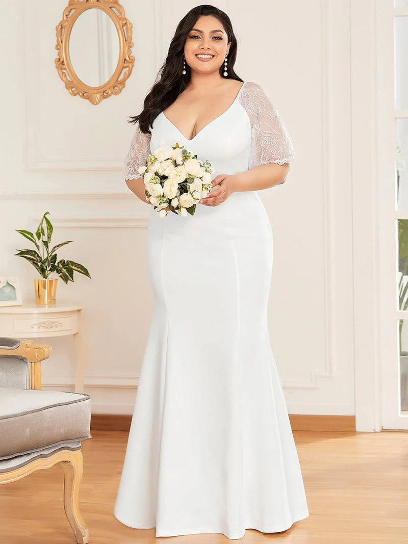 White plus size wedding dress with V-Neck and fishtail.