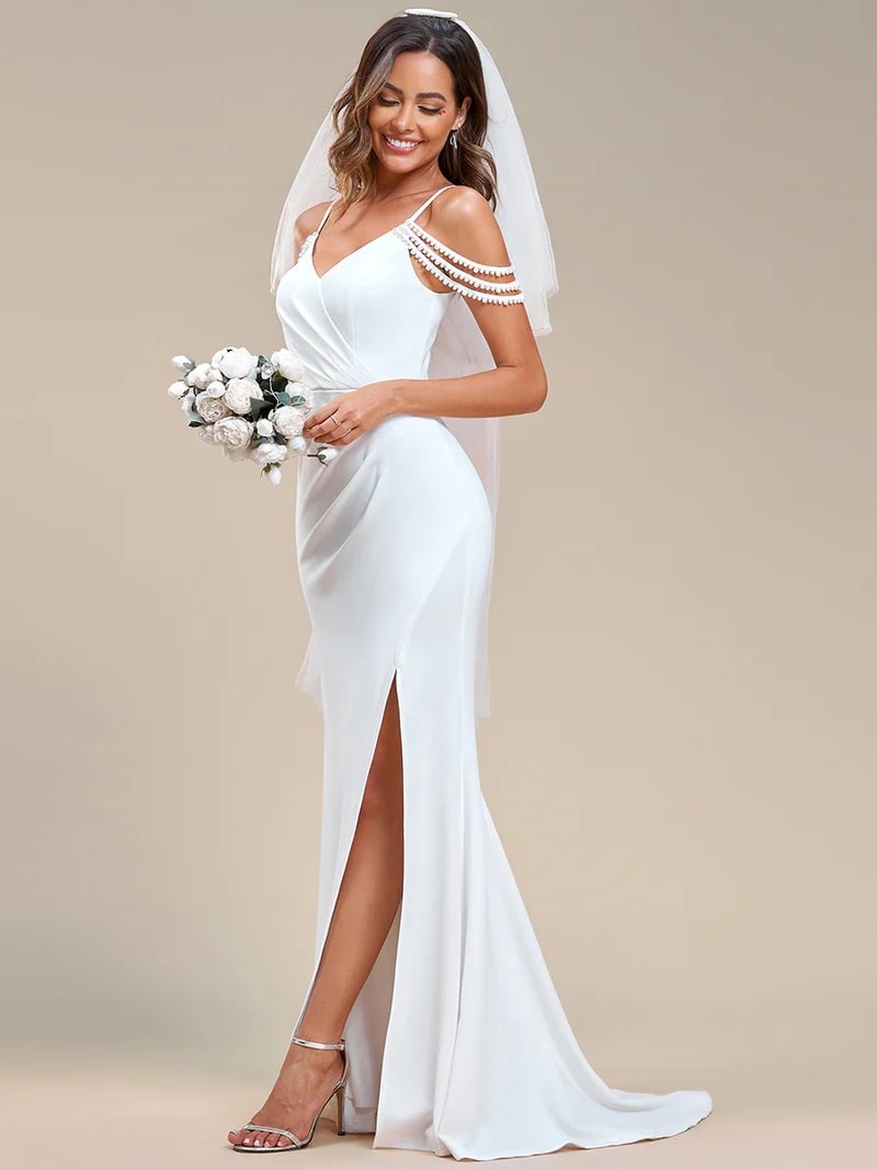 White wedding dress with halter side split and fishtail.